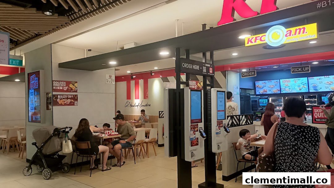 Customers dine and order at self-service kiosks inside a busy KFC restaurant.