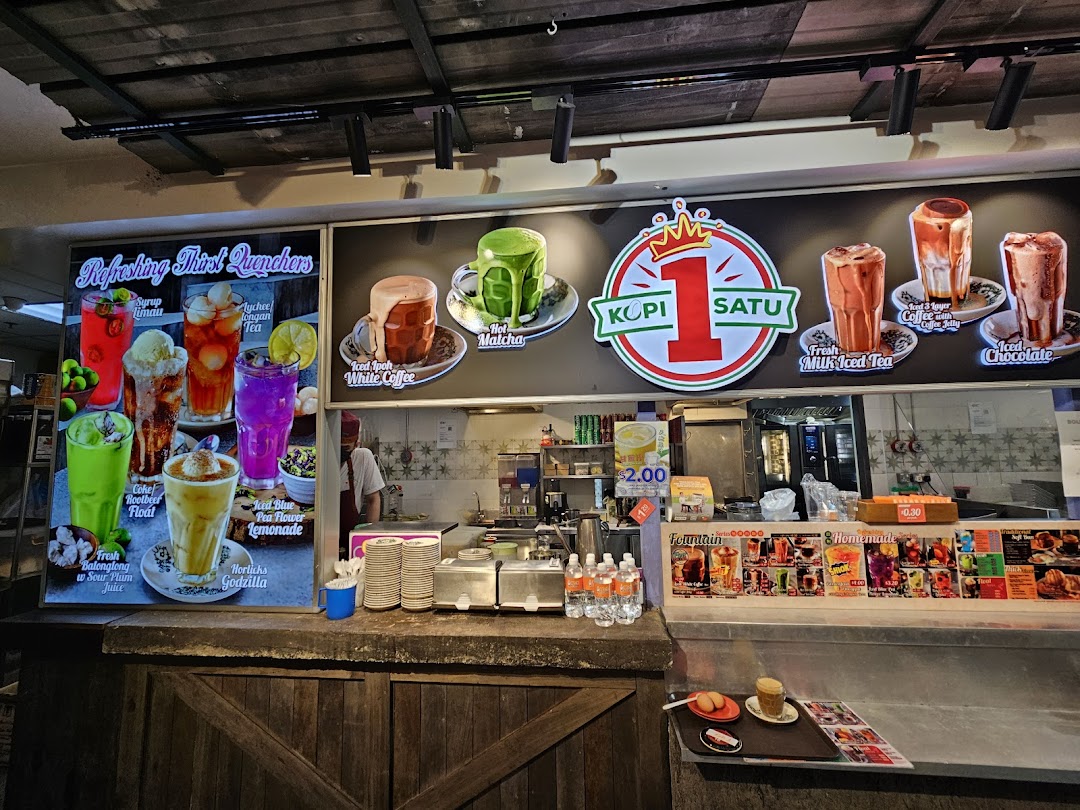 A vibrant display board at Kopi Satu showcasing a variety of refreshing drinks and signature coffee creations.