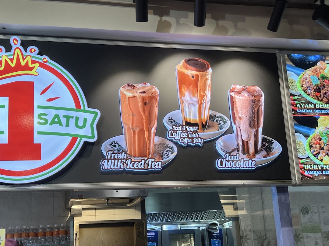 A display board showcasing Kopi Satu's refreshing iced beverages and glimpses of main dishes.