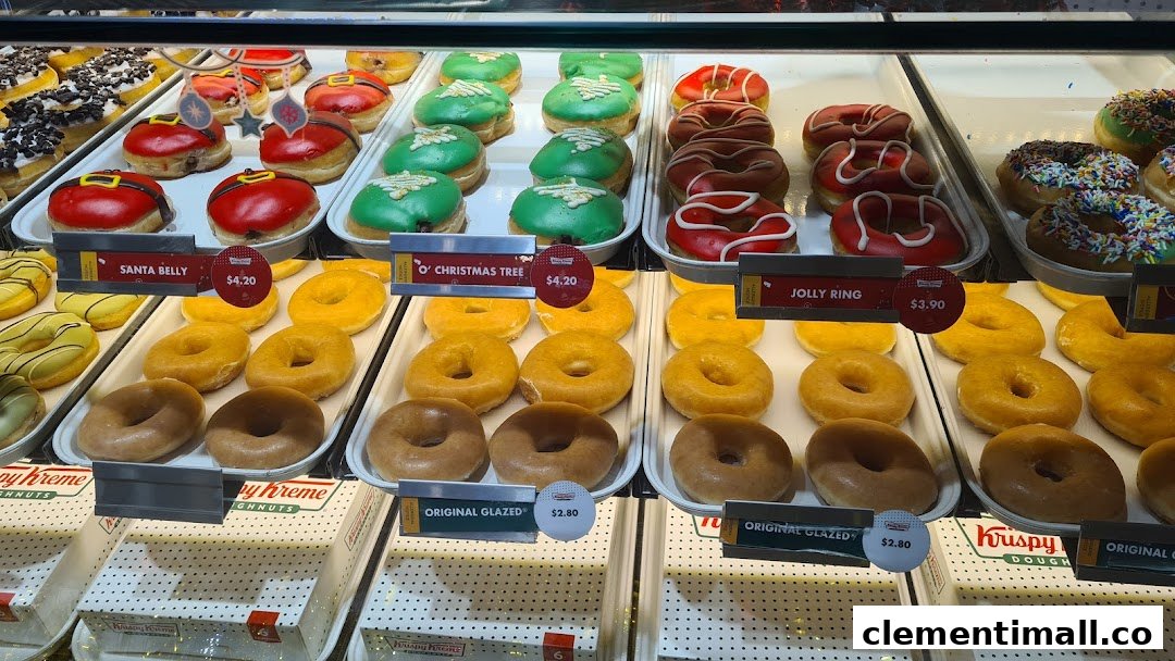 A vibrant display of Krispy Kreme donuts, including festive seasonal and classic glazed varieties.