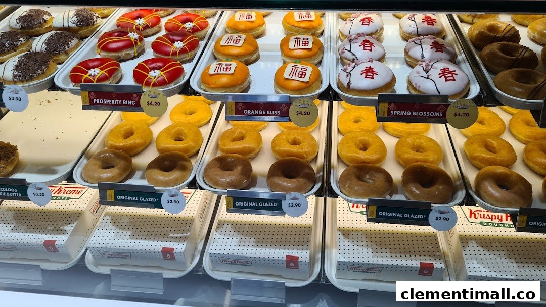 A vibrant display of various Krispy Kreme donuts, including seasonal and classic glazed options.