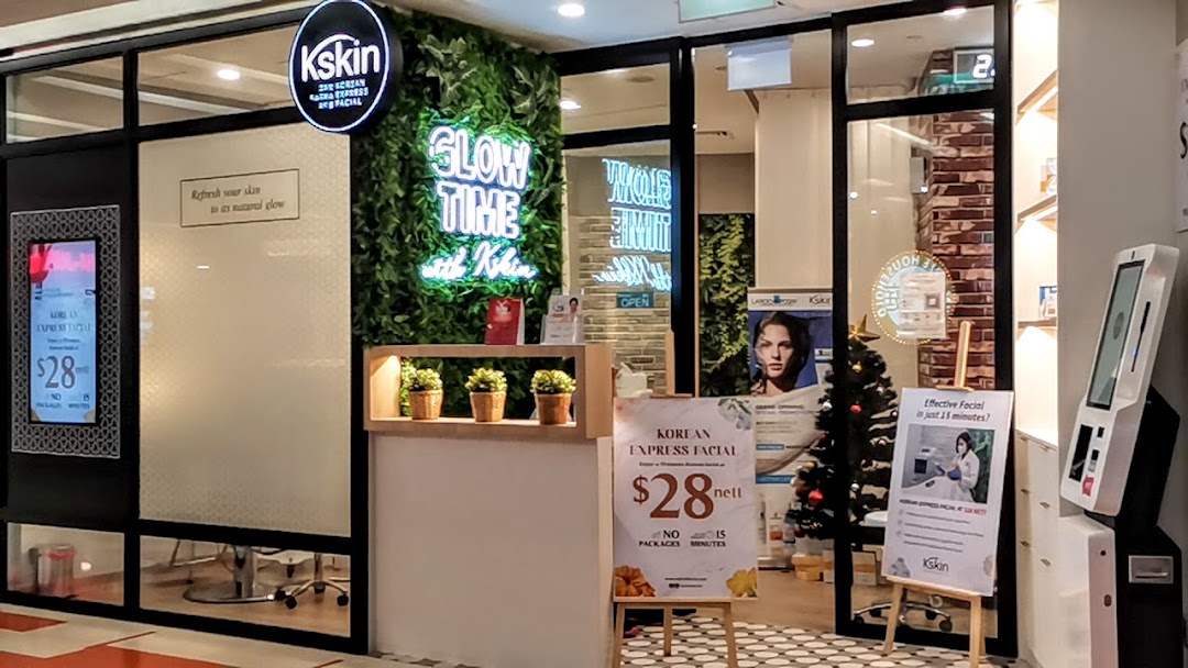 The Kskin Korean Express Facial shop front with promotional signs and festive decor.