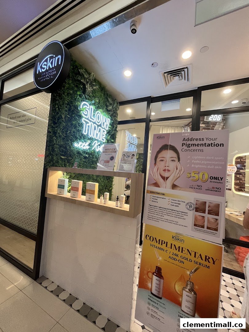 The inviting shop front of Kskin Korean Express Facial, featuring a green wall and promotional displays.