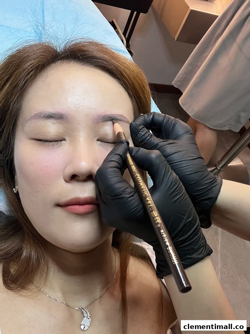 A close-up of a client receiving an eyebrow enhancement service at La Vida.