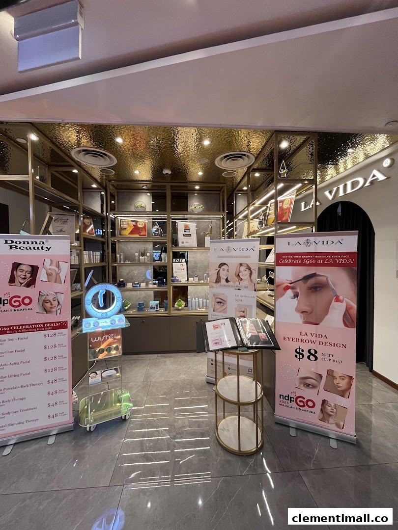 Interior of La Vida beauty shop, featuring product displays and promotional banners for beauty treatments.