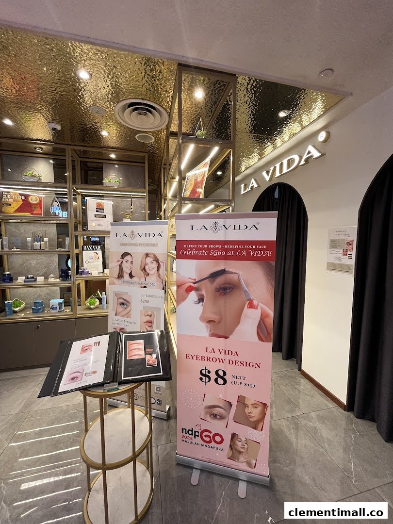 Interior view of La Vida beauty salon, showcasing product displays and eyebrow design promotions.