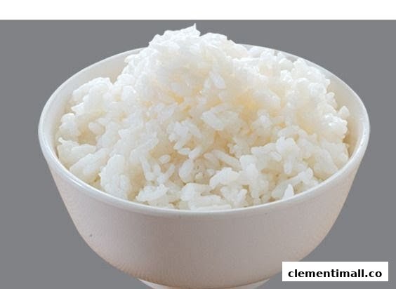 A white bowl filled with fluffy, perfectly cooked white rice.