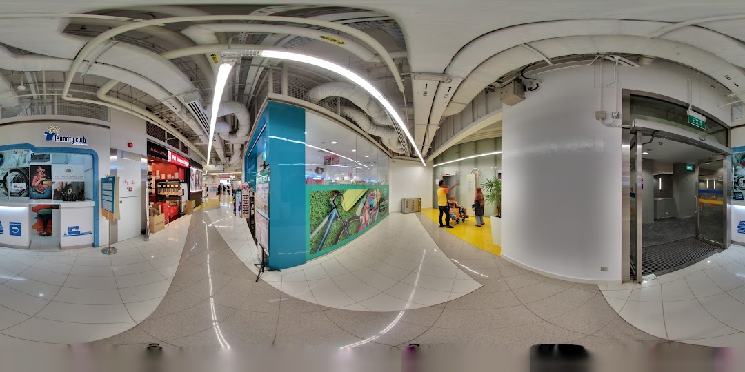 Front of Laundry Club at Clementi Mall, featuring self-service laundry machines.