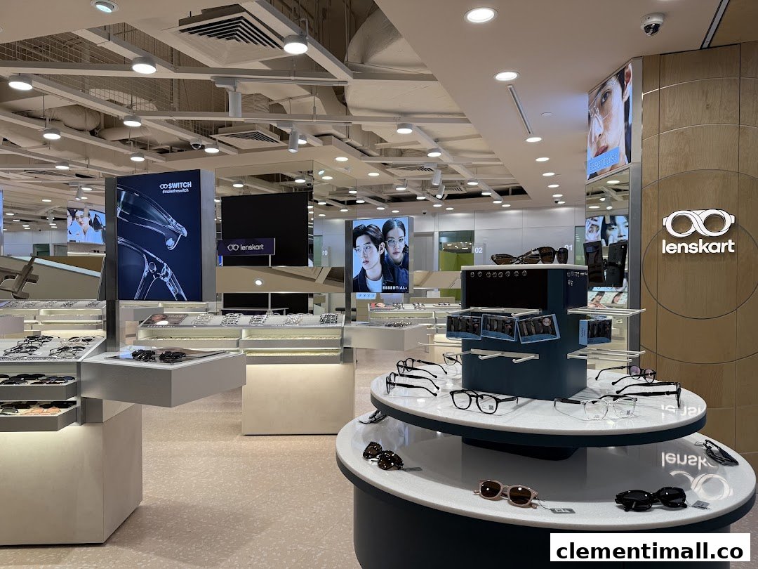 Interior view of Lenskart store showcasing a wide range of eyeglasses and sunglasses on modern display units.