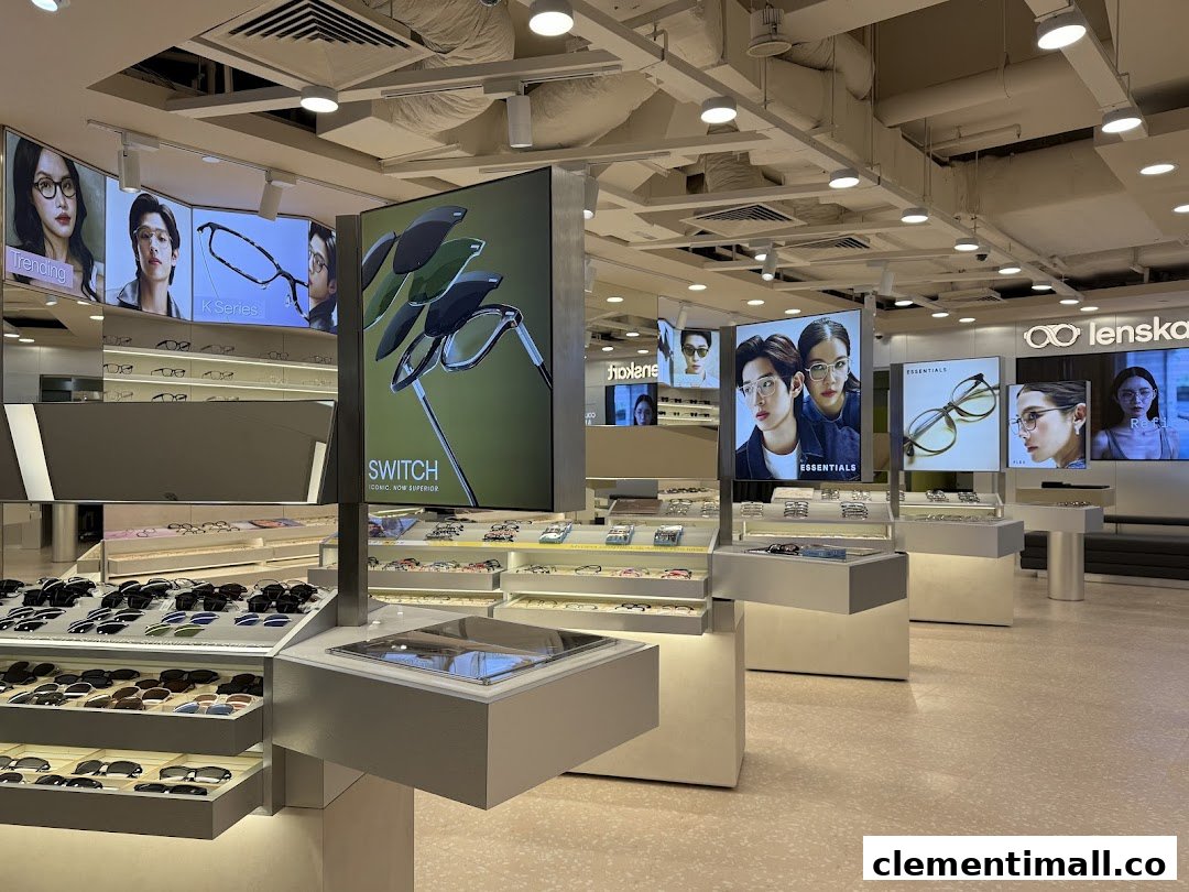 Interior view of Lenskart showcasing a wide range of eyewear displays and digital marketing screens.
