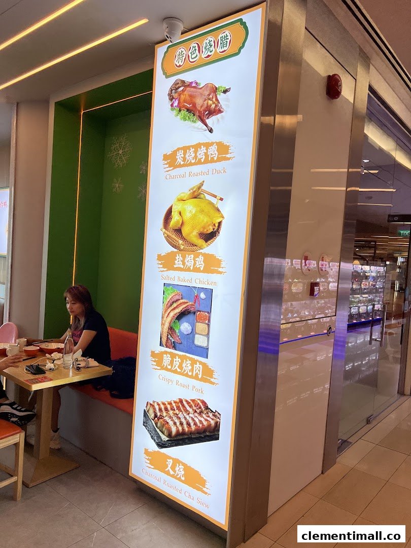 A brightly lit display board showcases M.Y Duck's signature roasted meats, including duck, chicken, and pork.