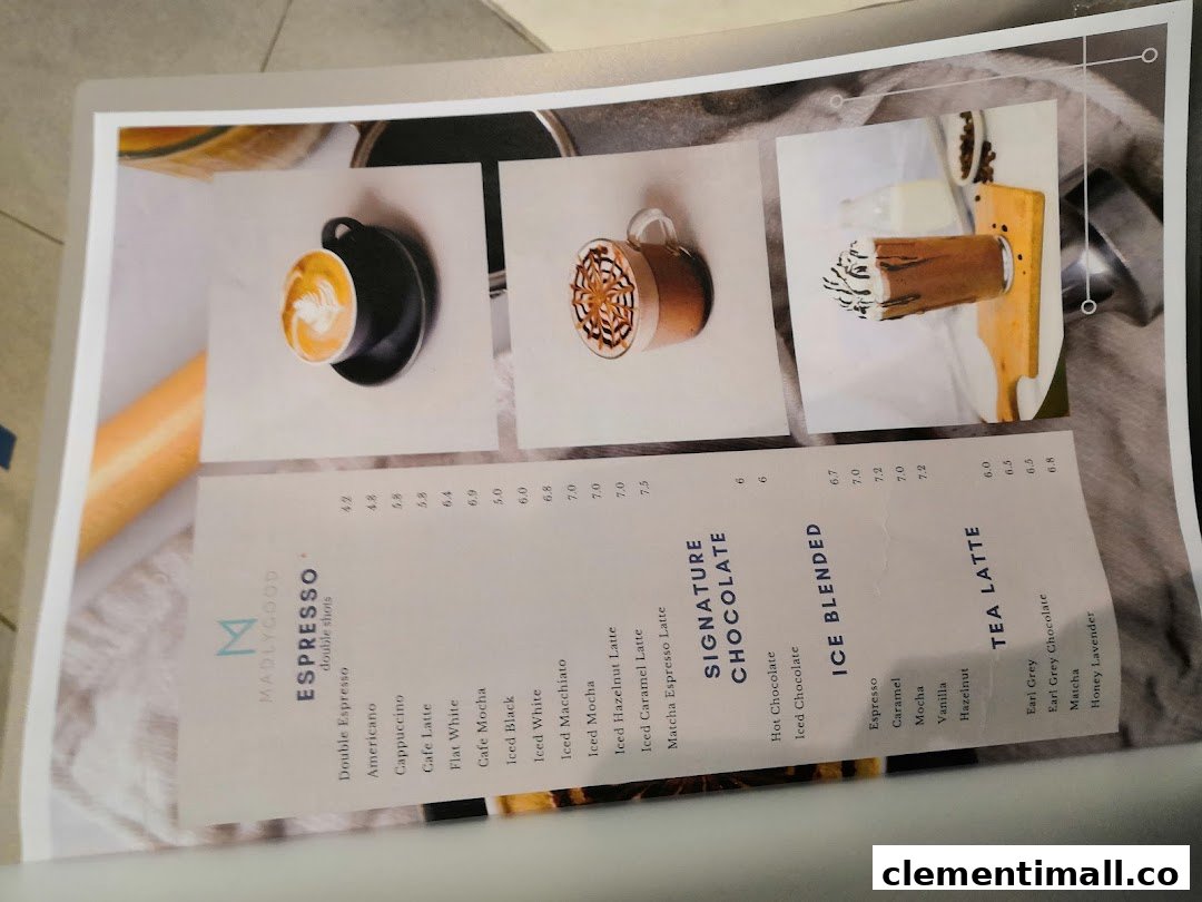 A detailed menu from MADLYGOOD, showcasing various coffee, chocolate, and tea beverages.