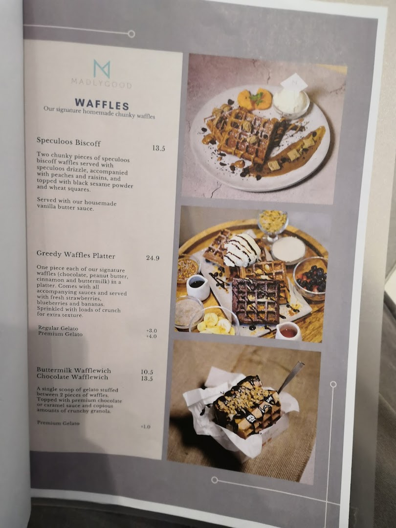 A detailed menu showcasing MADLYGOOD's signature waffles and wafflewiches with prices and descriptions.