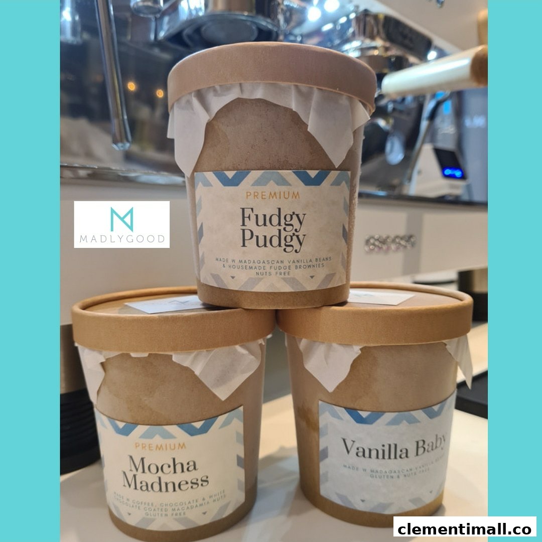 Three premium dessert tubs from MADLYGOOD, showcasing Fudgy Pudgy, Mocha Madness, and Vanilla Baby flavors.