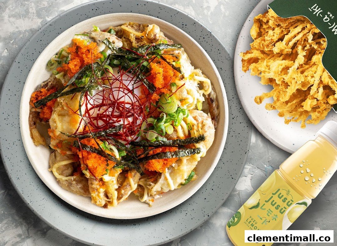 A vibrant bowl of Japanese food with fried mushrooms and a yuzu lemonade drink.