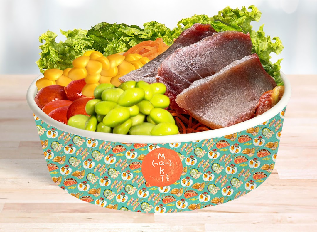 A vibrant poke bowl filled with fresh tuna, edamame, corn, tomatoes, and greens.