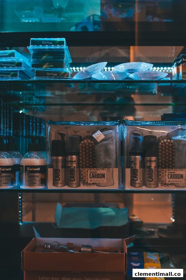 Close-up of shelves displaying various shoe care products and accessories, including gels and cleaning kits.