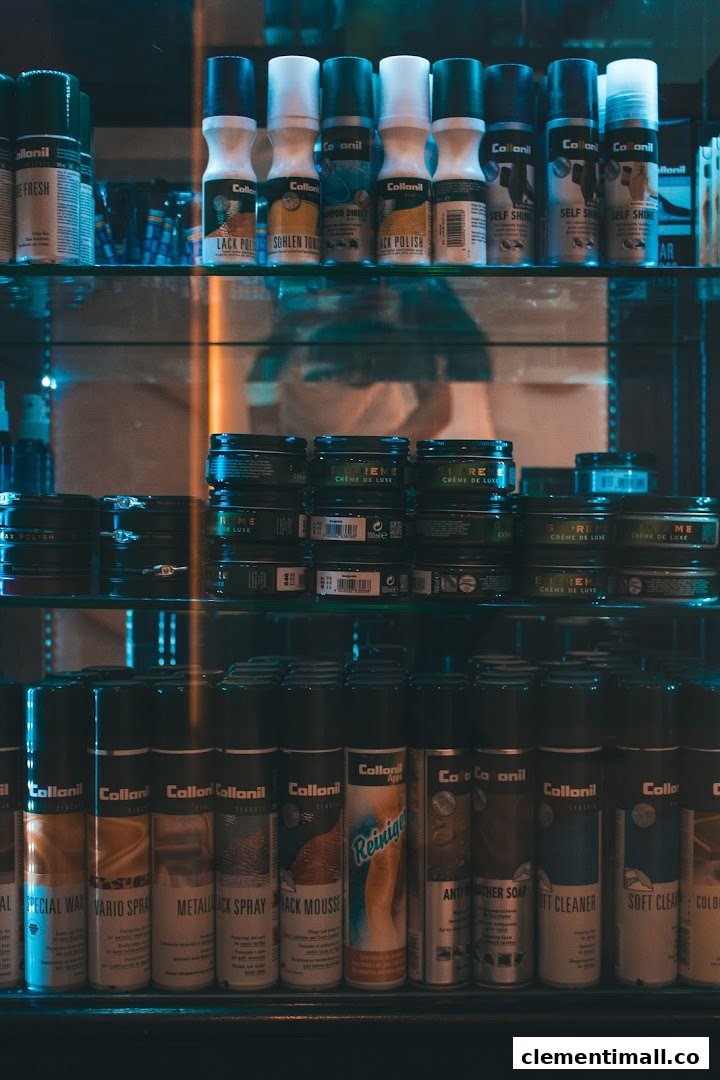 Shelves displaying a wide range of shoe care products, including polishes, sprays, and creams.