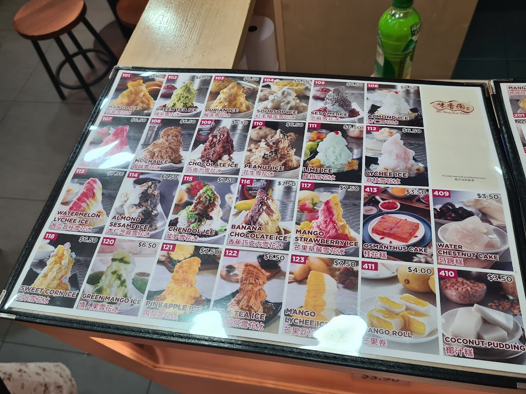 A vibrant menu displaying a wide variety of shaved ice desserts and traditional Asian sweets.