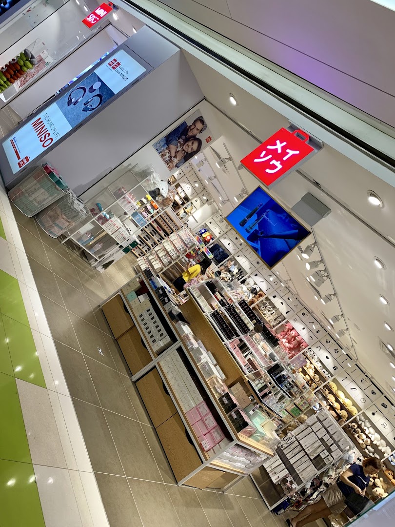 An interior view of MINISO, showcasing a wide array of trendy and affordable lifestyle products on display.