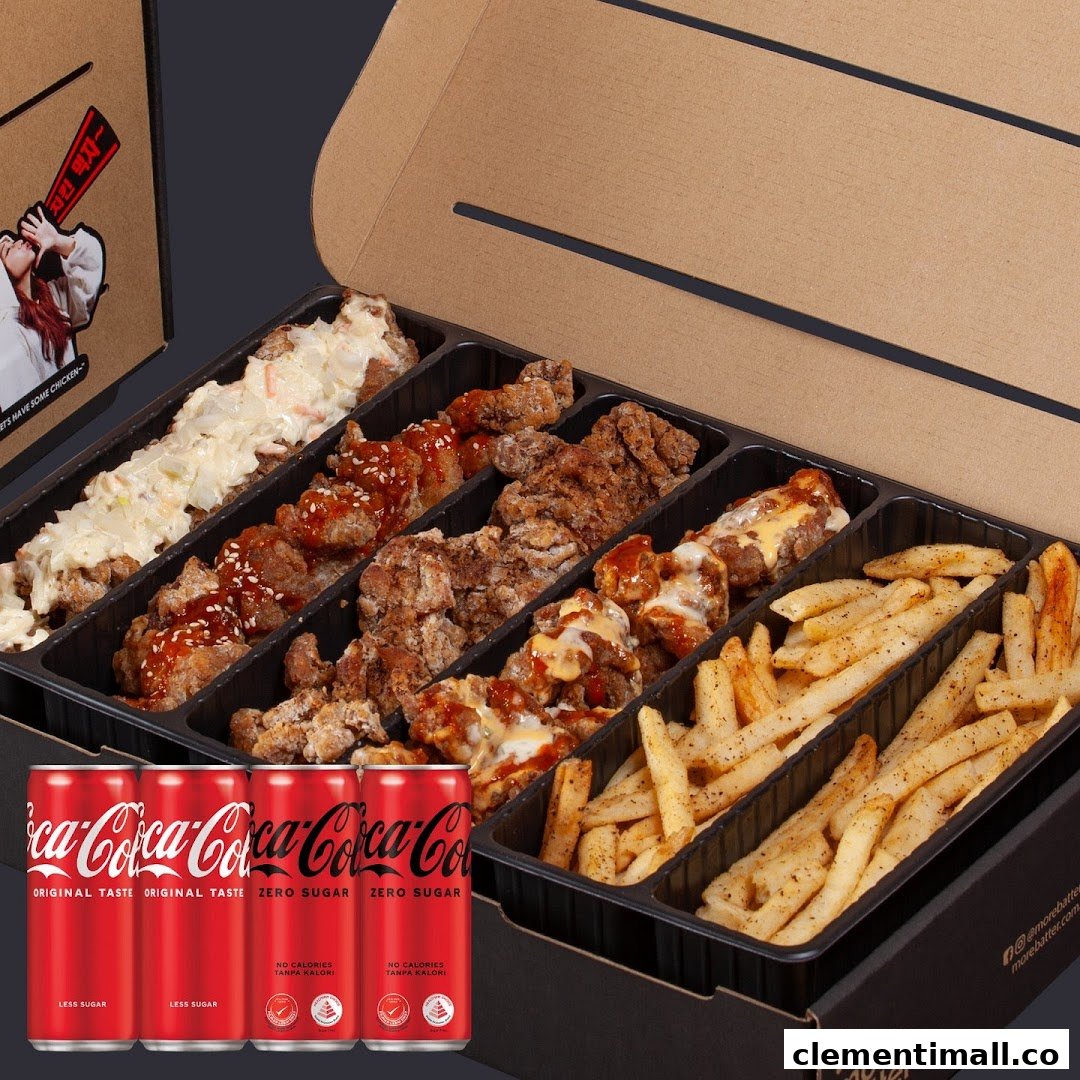 A variety box of fried chicken, fries, and Coca-Cola cans, perfect for sharing.