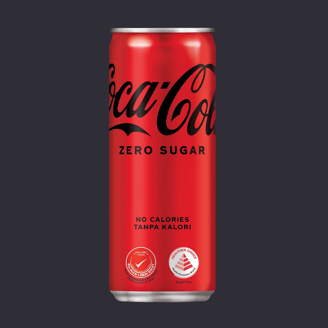 A vibrant red can of Coca-Cola Zero Sugar, highlighting its no-calorie and healthier choice attributes.