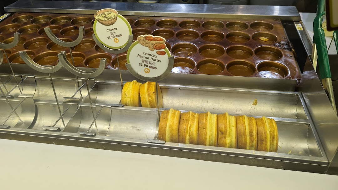Freshly made pancakes with cheese and peanut butter fillings displayed at Mr Bean.