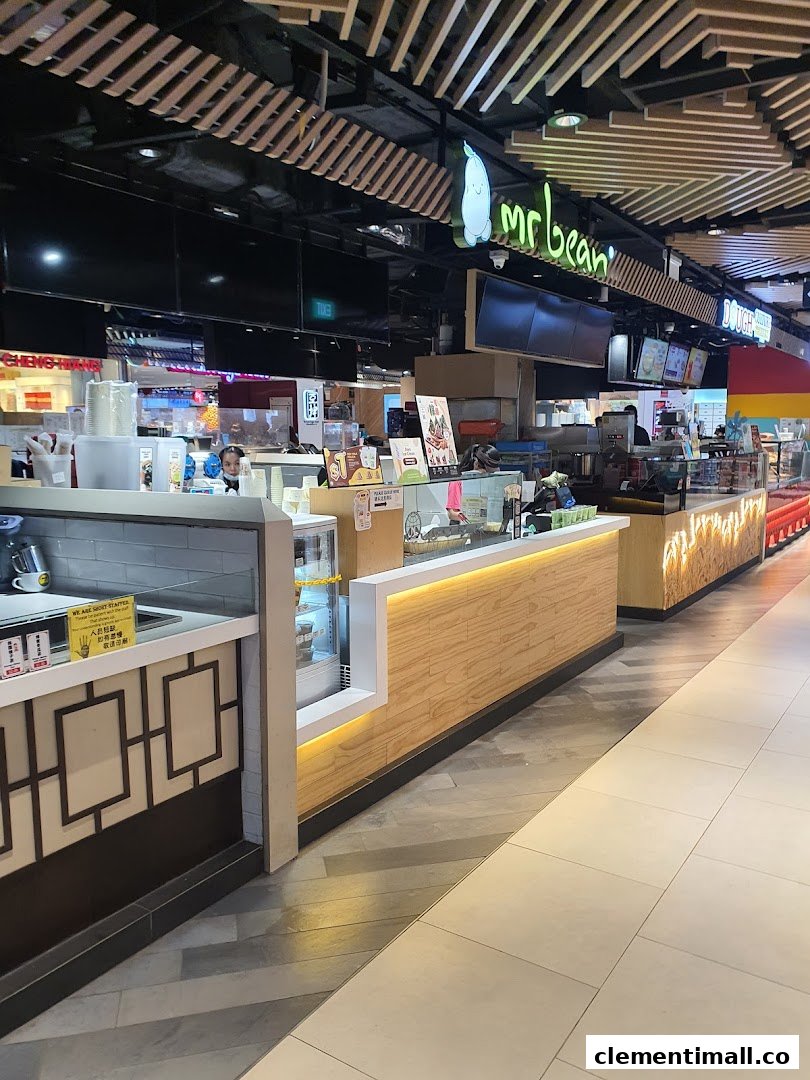 An interior view of the Mr Bean food stall counter, showcasing display cases and staff.