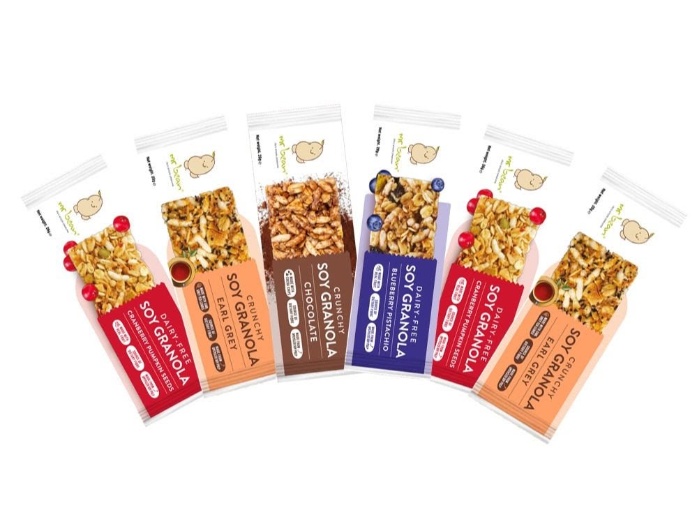 A vibrant display of Mr Bean's diverse soy granola bar flavors.