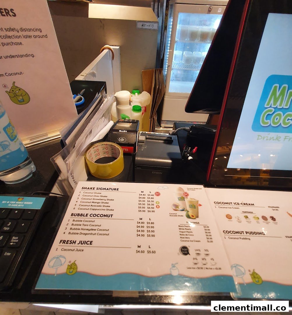 A close-up of Mr Coconut's menu board, showcasing various coconut-based drinks and desserts.