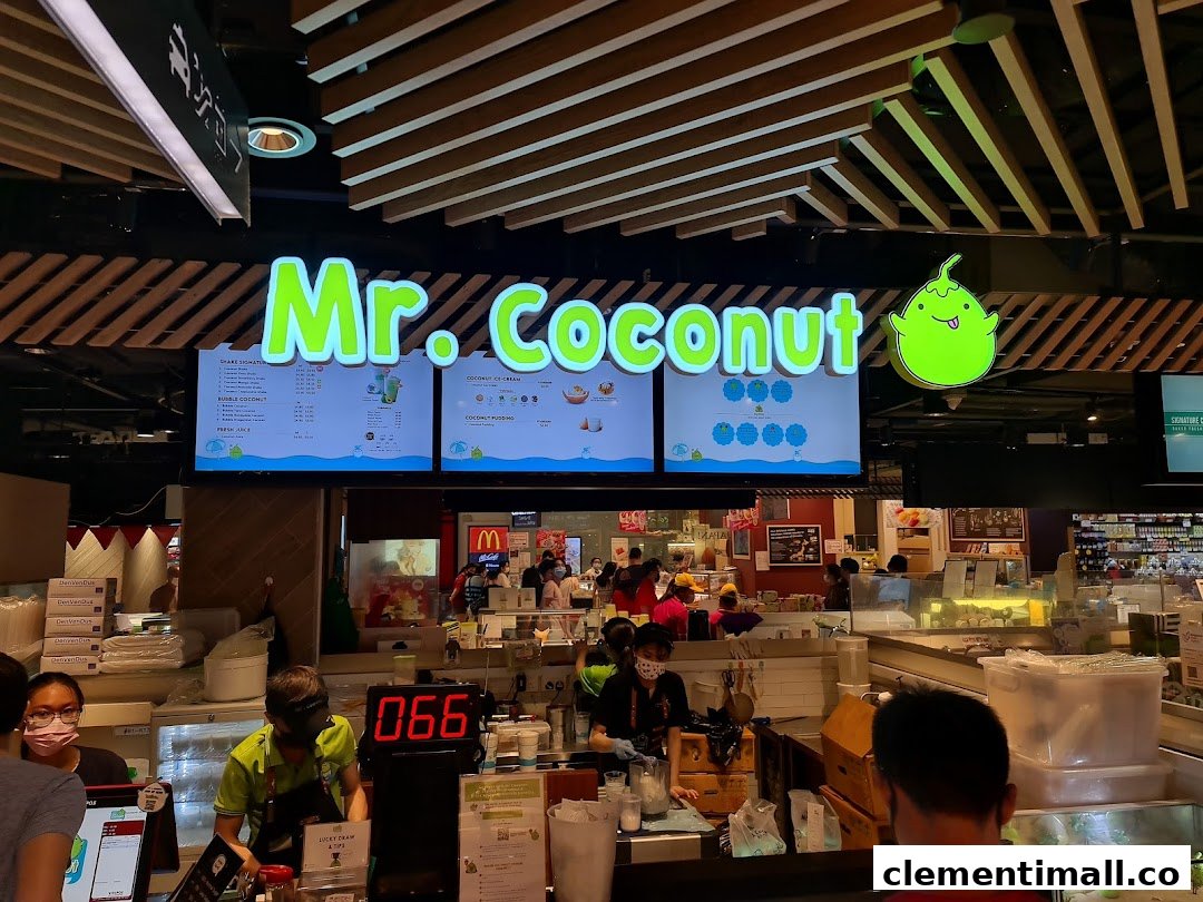 Digital menu boards displaying a variety of coconut-based drinks and desserts at Mr Coconut.