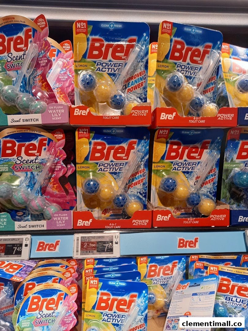 A retail display of Bref toilet cleaning products, including Power Active and Scent Switch.