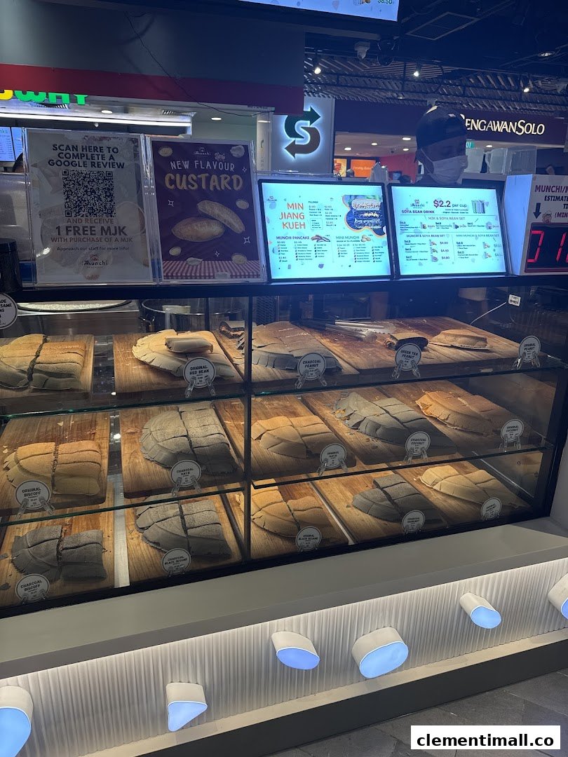 A vibrant display counter at Munchi Pancakes showcasing various traditional and modern pancake flavors.