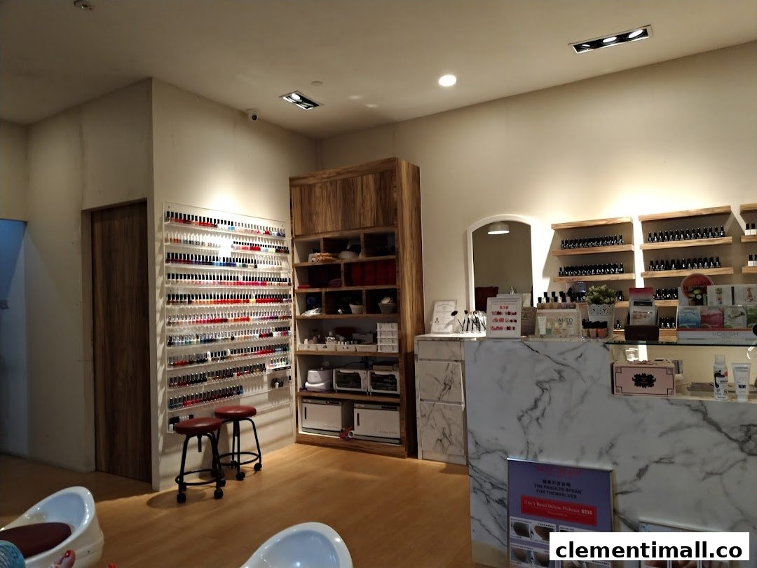 Interior view of Nailz Treats salon, featuring a vast nail polish display, service counter, and seating.