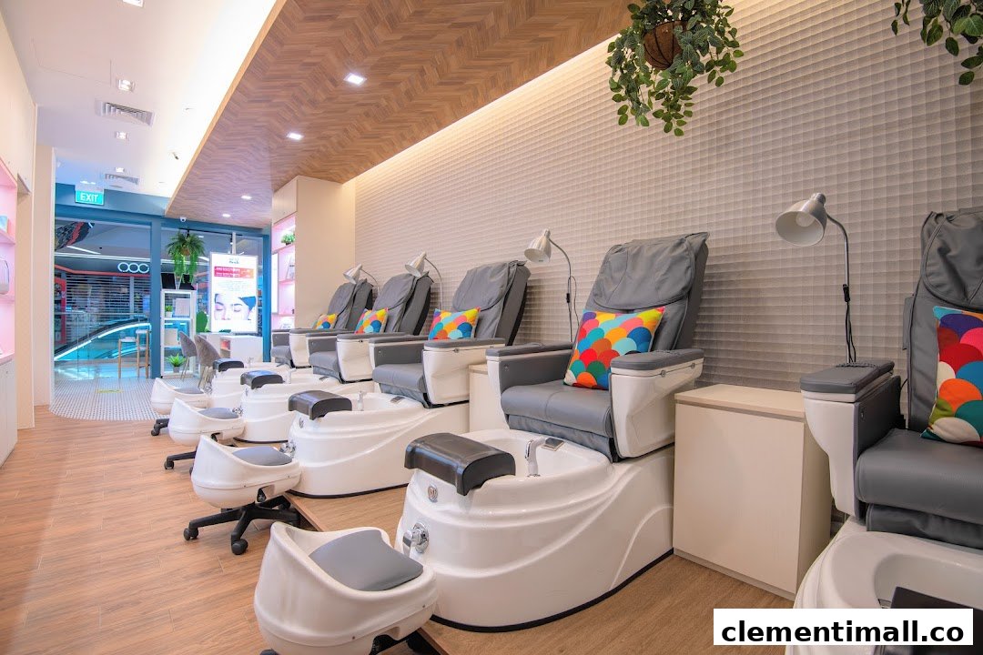 A modern nail salon interior featuring multiple comfortable pedicure chairs with foot basins.