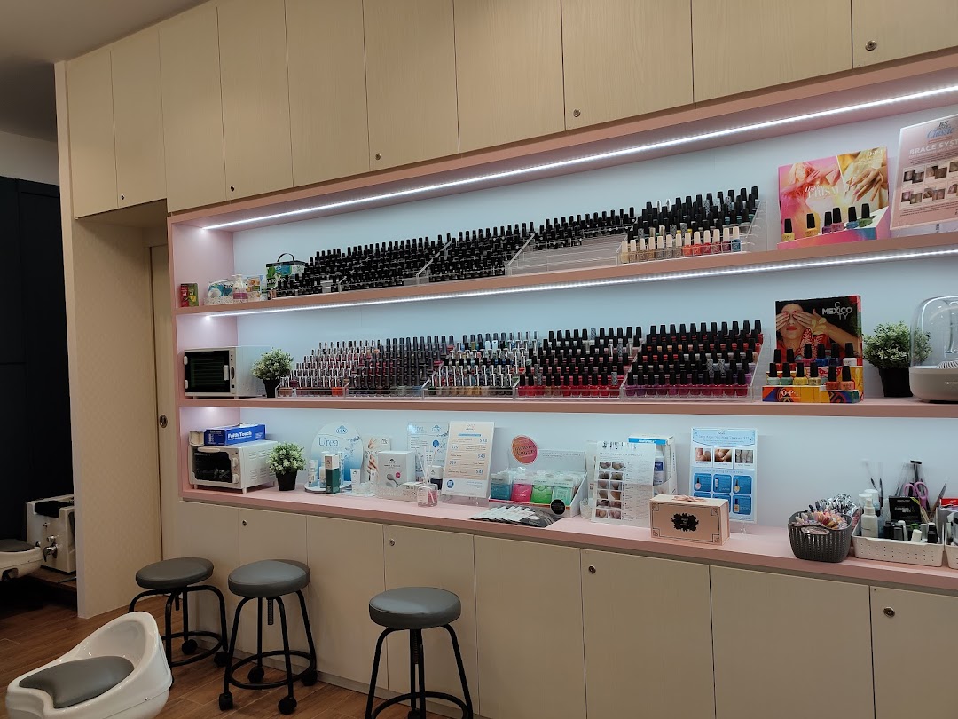 Interior of Nailz Treats, showcasing a vibrant display of nail polish colors and beauty products.