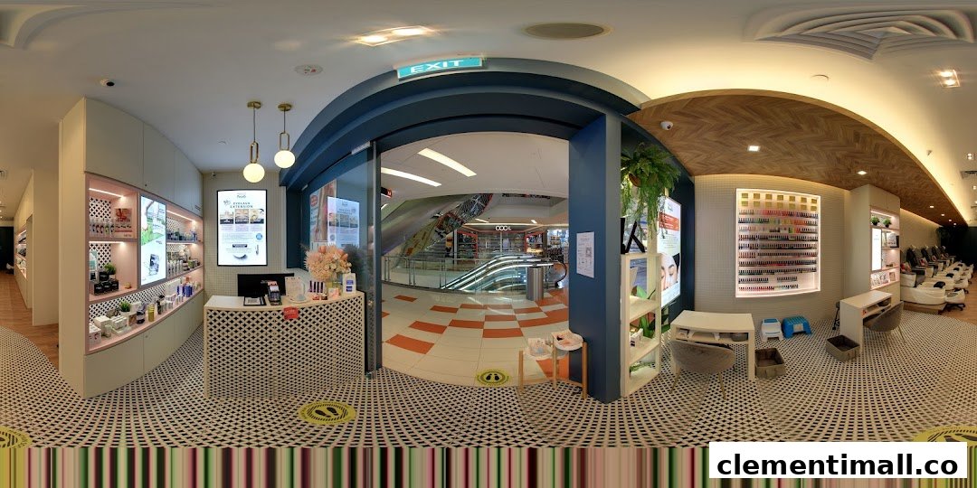 Interior view of Nailz Treats salon, featuring reception, product displays, and nail service stations.