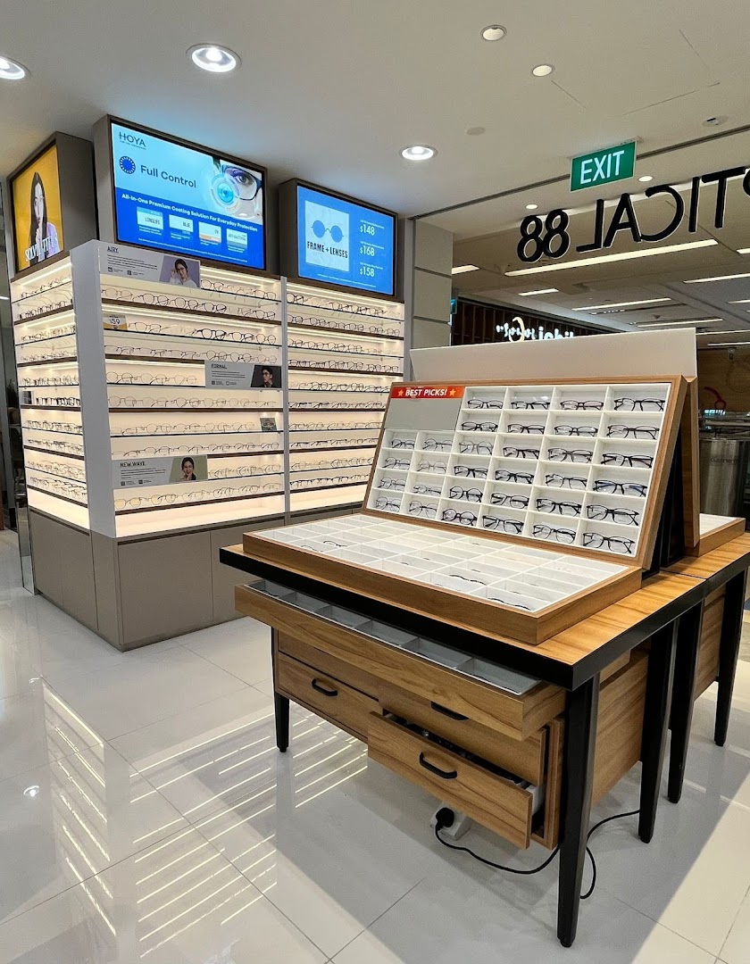 Interior view of Optical 88, showcasing a wide selection of eyeglasses on modern display units.