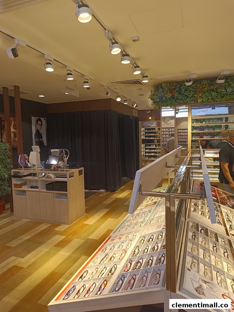 Interior view of OWNDAYS Clementi Mall, showcasing eyewear displays, reception, and fitting areas.