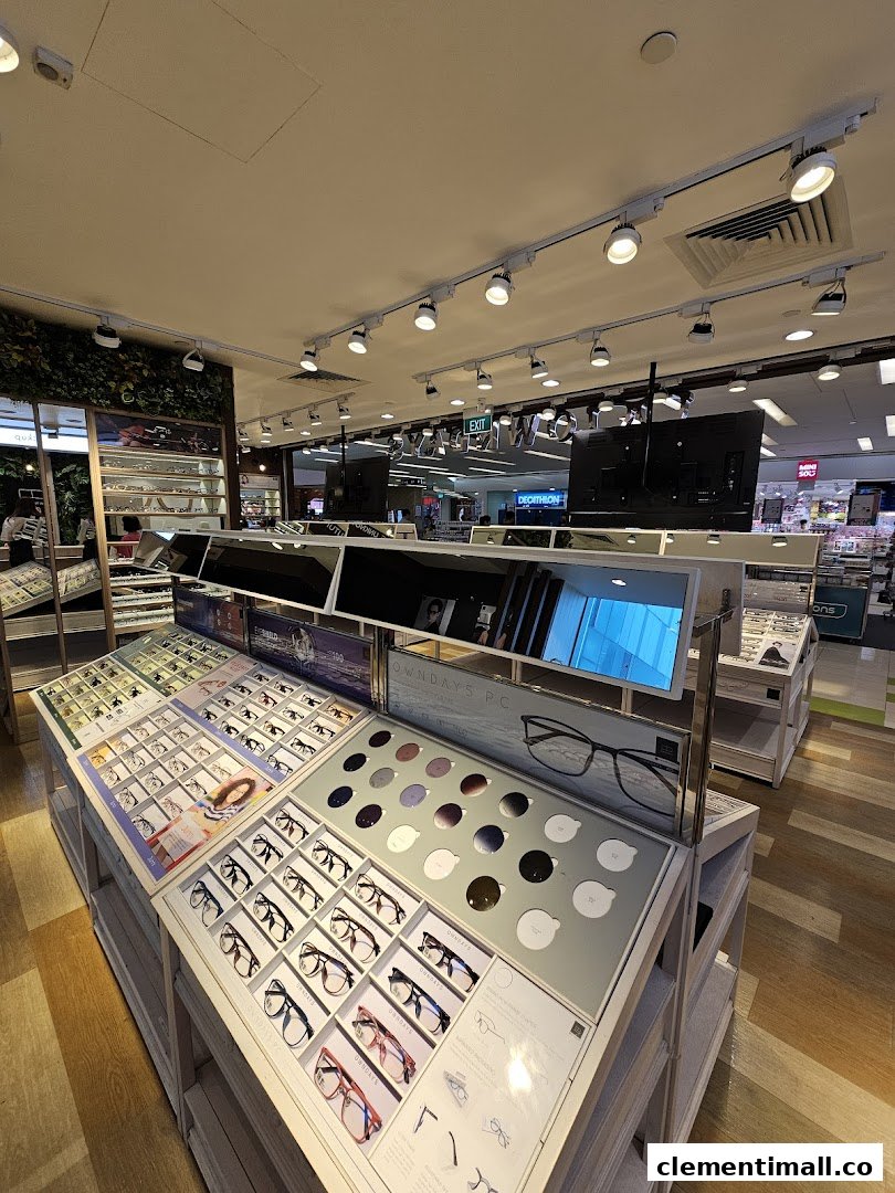 Interior view of OWNDAYS eyewear store, showcasing various glasses displays and a wide selection of frames.