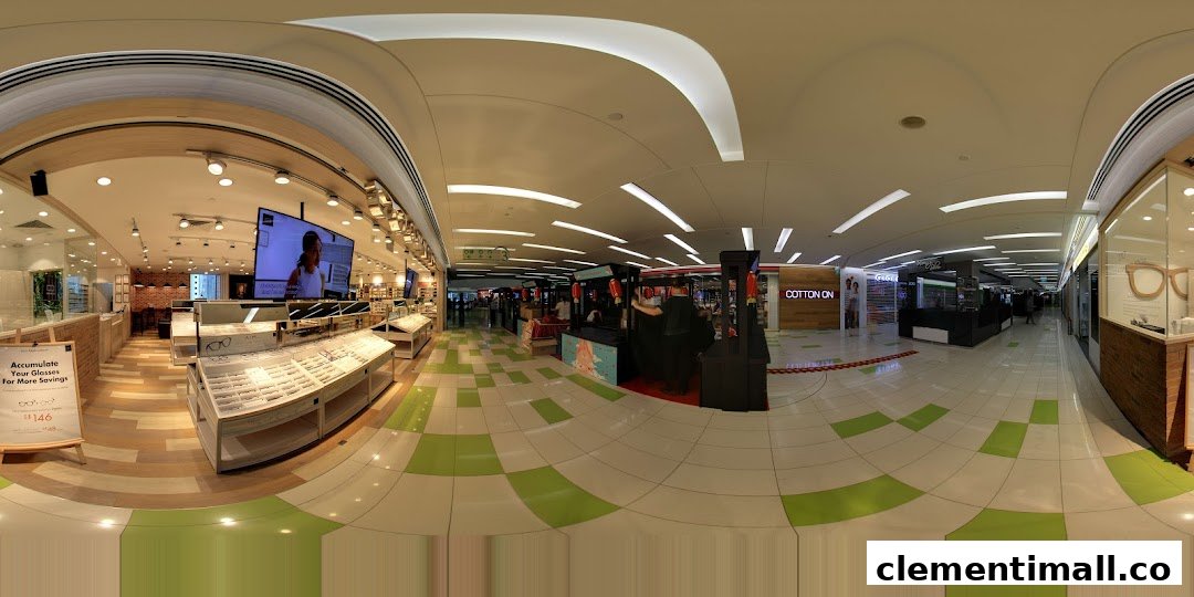 Interior view of OWNDAYS eyewear store, showcasing extensive frame displays and a large digital screen.