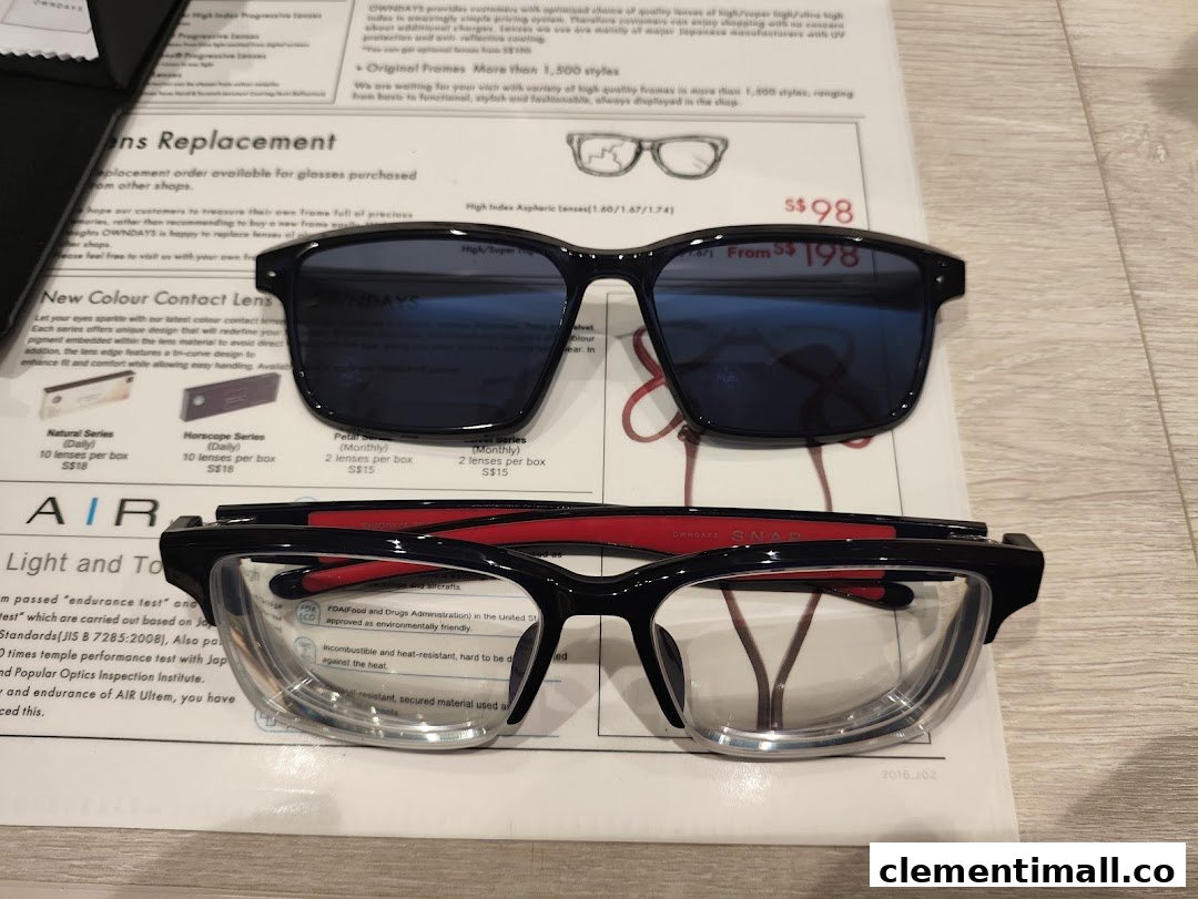 Close-up of OWNDAYS eyeglasses, sunglasses, and informational documents detailing lens options and contact lenses.