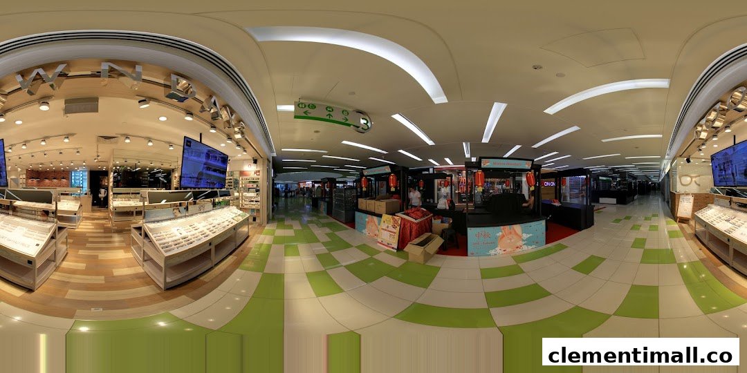 An interior panoramic view of OWNDAYS eyewear store, showcasing numerous glasses displays and a spacious layout.