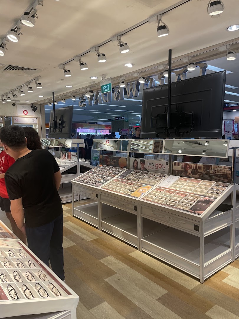 Customers browse a wide selection of eyeglasses on display at OWNDAYS Clementi Mall.