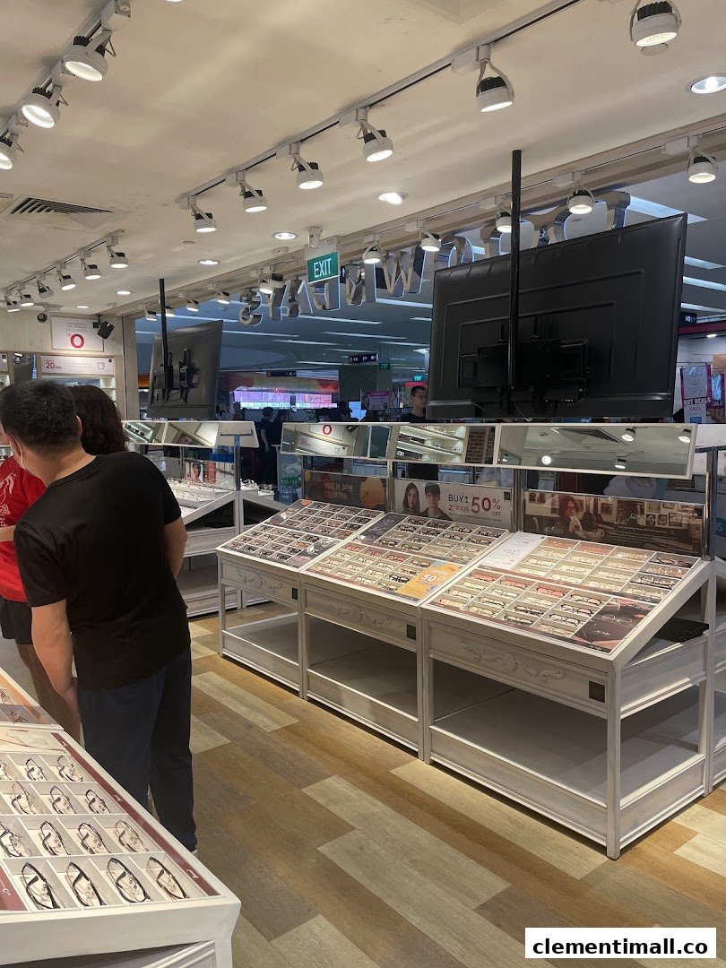 Customers browse a wide selection of eyeglasses on display at OWNDAYS Clementi Mall.