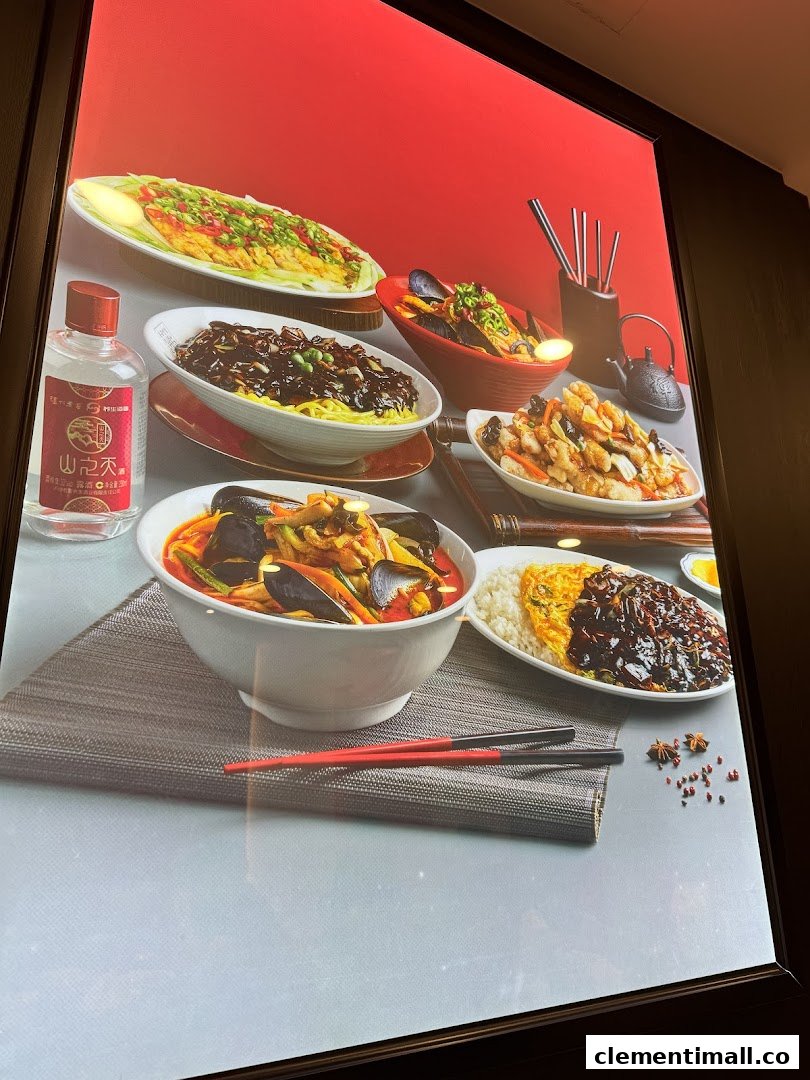 A vibrant display showcasing various Korean-Chinese dishes like Jajangmyeon, Jjamppong, and Tangsuyuk.