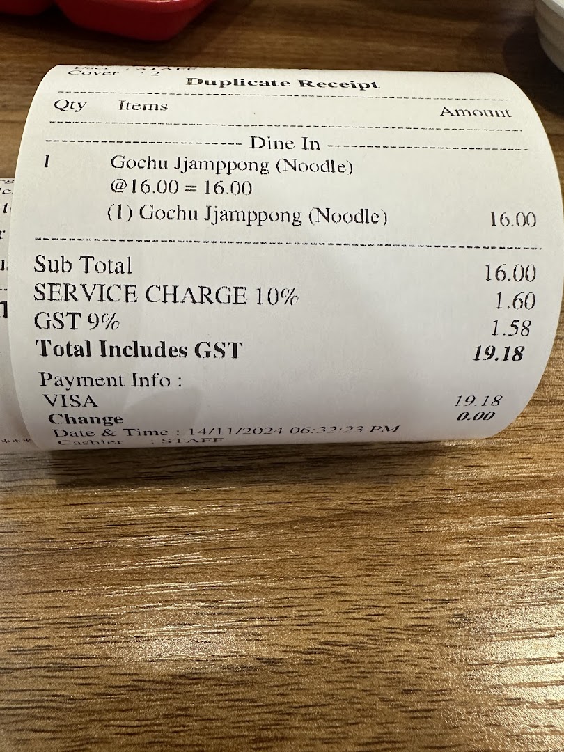 A duplicate receipt from Paiks Noodle showing a single order of Gochu Jjamppong (Noodle) with total cost.