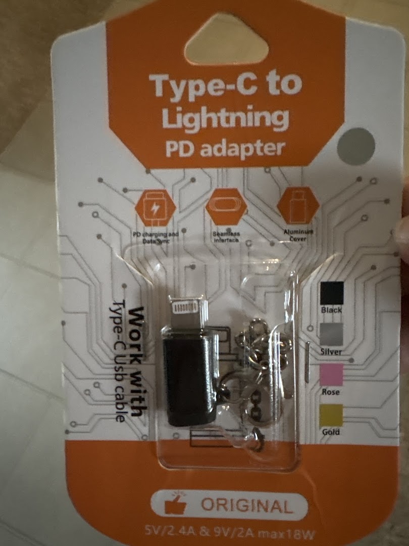 A packaged Type-C to Lightning PD adapter with features like fast charging and data sync.