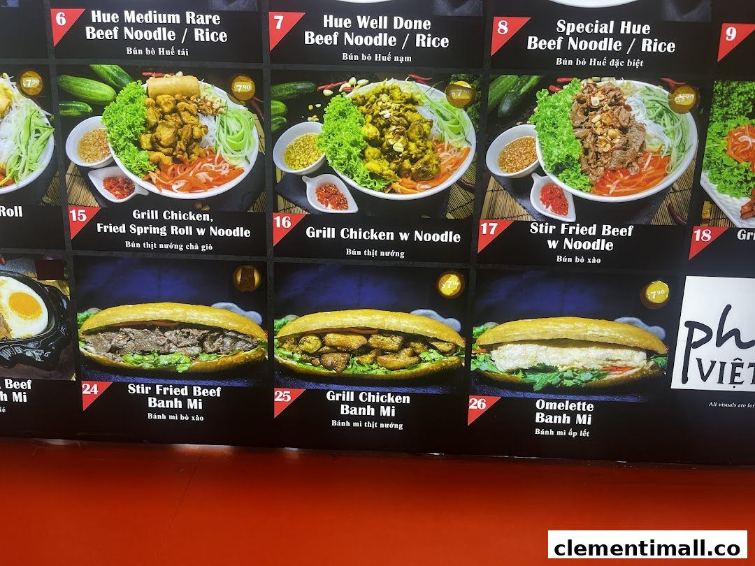 A vibrant menu board showcasing various Vietnamese noodle dishes and banh mi sandwiches.