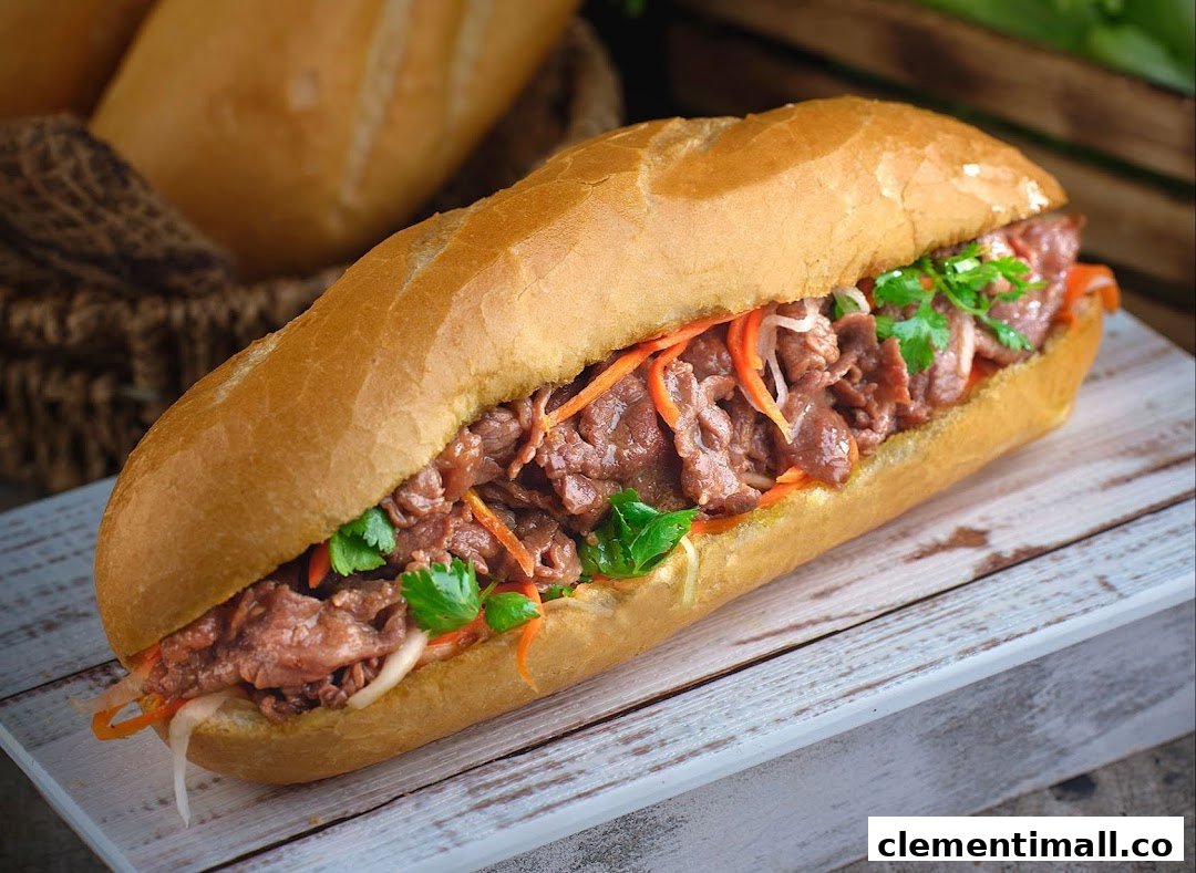 A close-up of a delicious Vietnamese Banh Mi sandwich filled with beef and fresh vegetables.